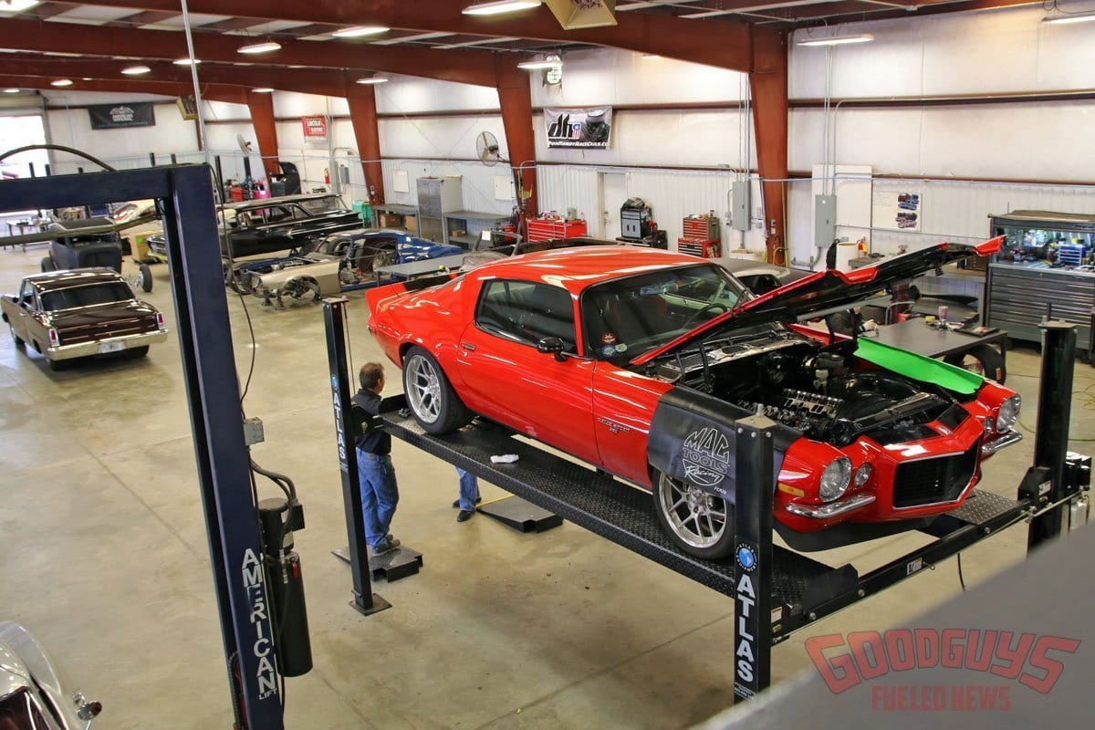 Inside Goolsby Customs Shop showing classic cars