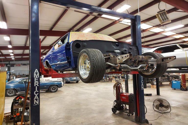 Custom 1969 SS Chevelle Pro Touring muscle car on lift