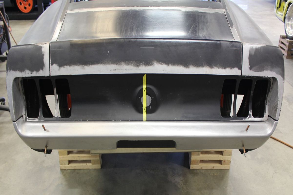 Custom 1969 Fastback Mustang with supercharged coyote engine rear bumper fabrication