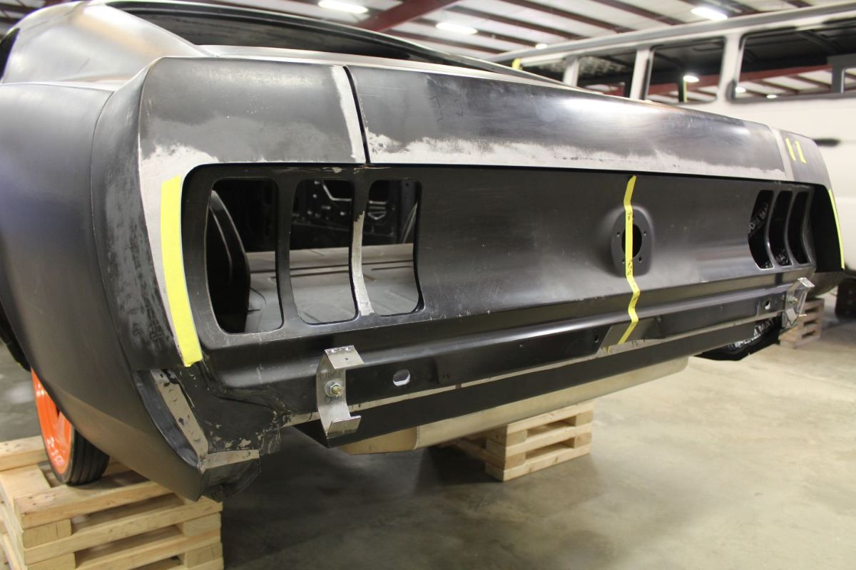 Custom 1969 Fastback Mustang with supercharged coyote engine rear end fabrication